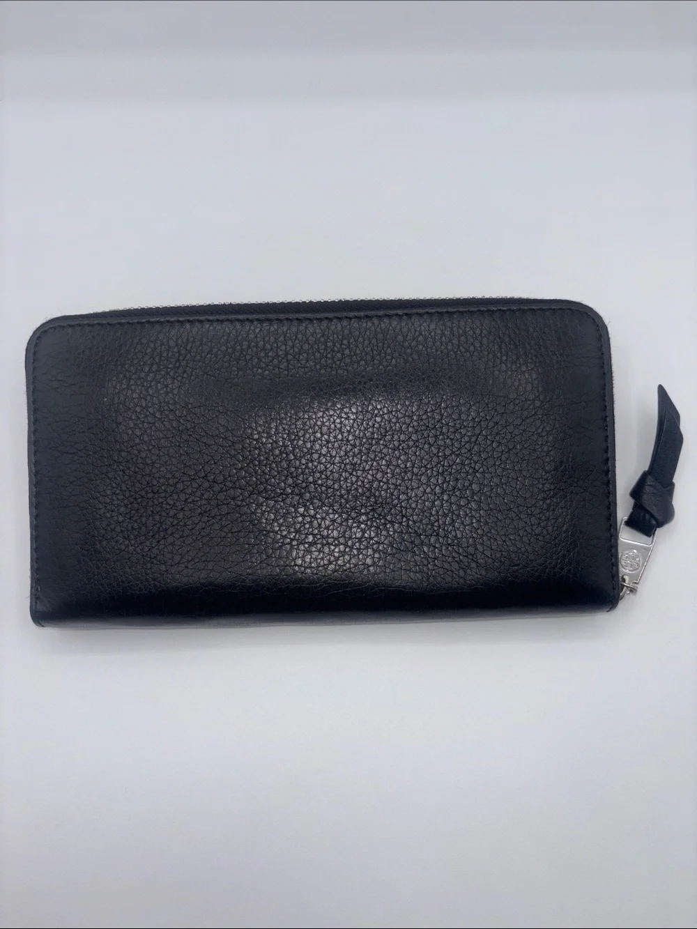 Tory Burch sleek zip